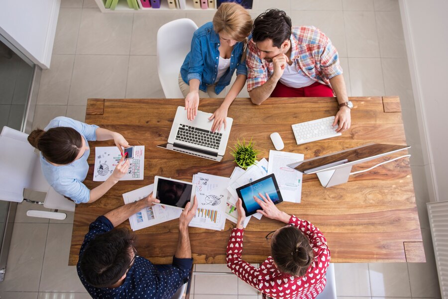 colleagues-working-office-relaxed-atmosphere_329181-12034